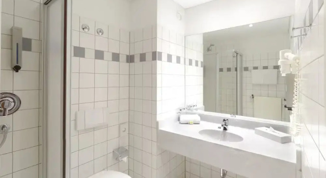 Четырёхместный номер Comfort PLAZA INN Zwickau
