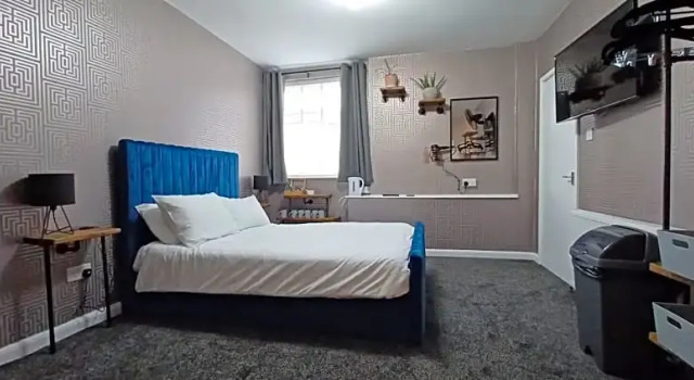 Семейный люкс с балконом Vinnies Family Hotel