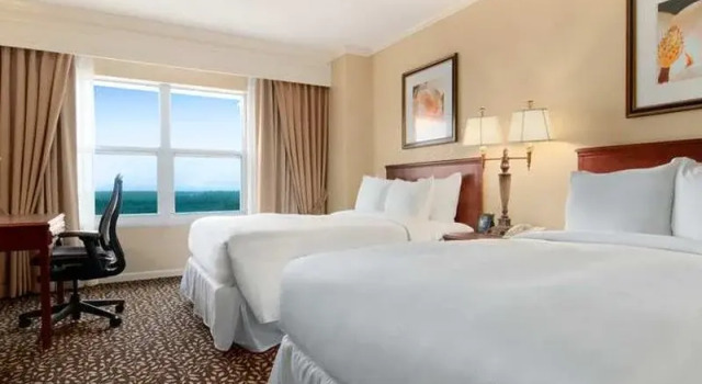 Airport Inn and Suites, Buchen Sie Hotel Paradise. USA