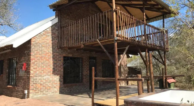 Коттедж с 4 комнатами Kruger Wild Dog Inn