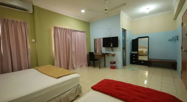 Трёхместный номер Standard OYO Homes 90575 C.k Bahau Homestay