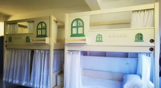 Кровать в общем номере Kashgar Ancient City Munag Hotel