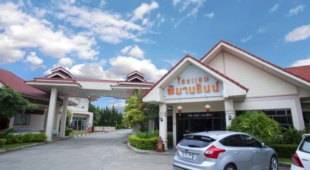 Кровать в общем номере Pimann Inn Hotel