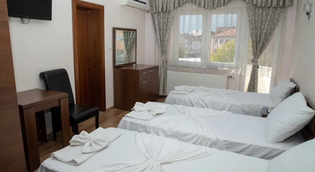 Ekonomiczny trzyosobowy pokój Hotel Leo