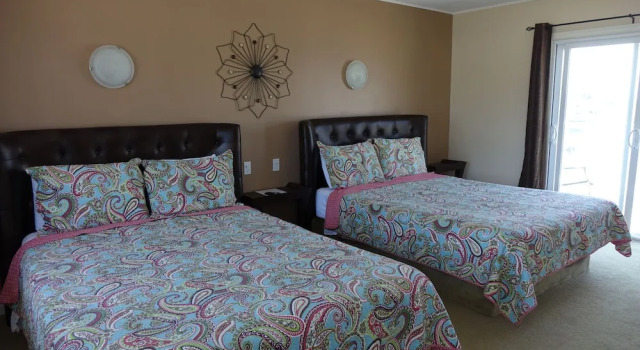 Четырёхместный номер Deluxe с балконом и с видом на океан Clifty Cove Motel
