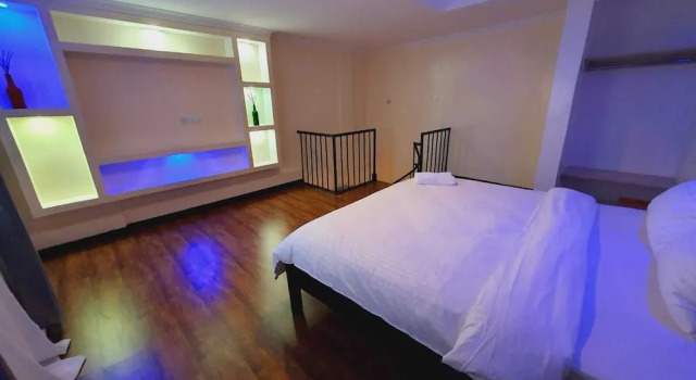 Habitación doble De lujo ático con balcón y con vista al terreno Comfort E Suites