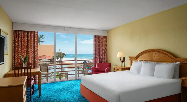 Dolphin Beach Resort, Забронировать Курортный отель Курортные отели Сент-Пит-Бич, Курортный отель