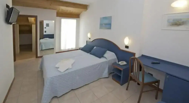Четырёхместный номер Standard с балконом Residence Torretta
