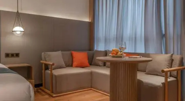 Кровать в общем номере Wenling Yadingwan Hotel