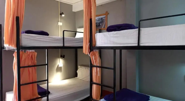 Кровать в общем номере Riverside Garden Hostel