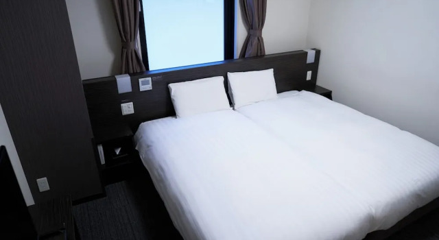 Двухместный номер Economy Dormy Inn Higashi Muroran