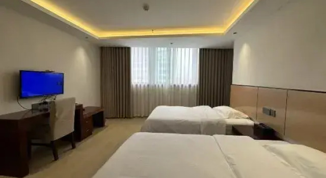 Номер Deluxe Enshi Xihe Business Hotel