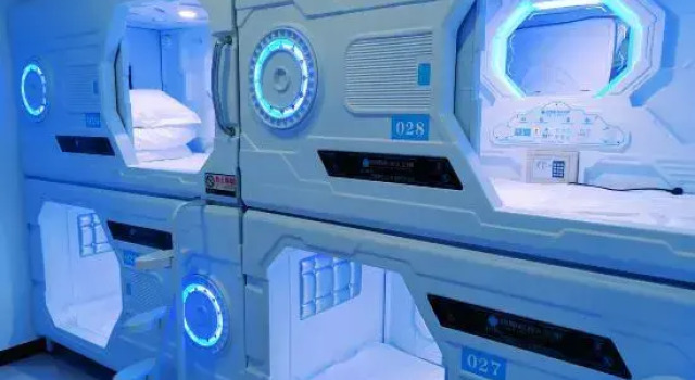 Кровать в общем номере Lanxin Hotel (Zhongchuan Airport Rainbow City)