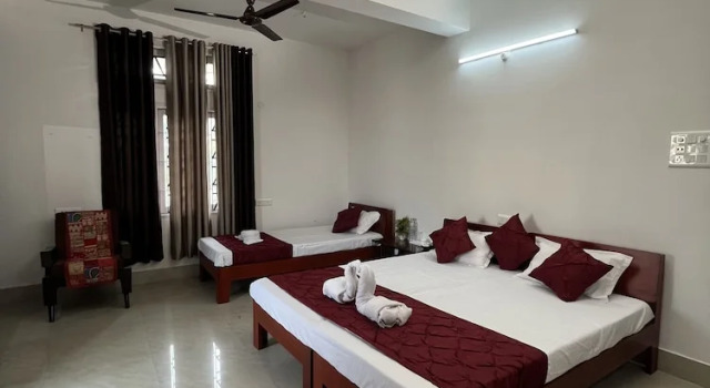 Deluxe triple chambre avec balcon USC Homestay
