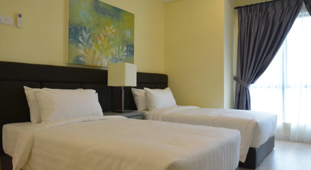 Czteroosobowy suite 2 sypialnie RPGC Garden Hotel