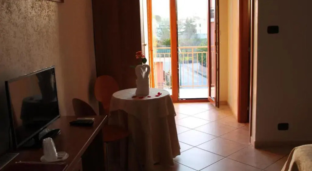 Четырёхместный номер Standard с балконом Hotel Il Giardino degli Aranci