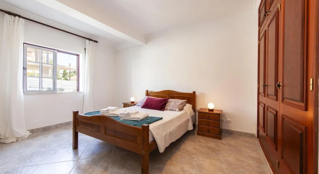 Студия W 01 - Bedroom 1 in Topside Luz Guesthouse