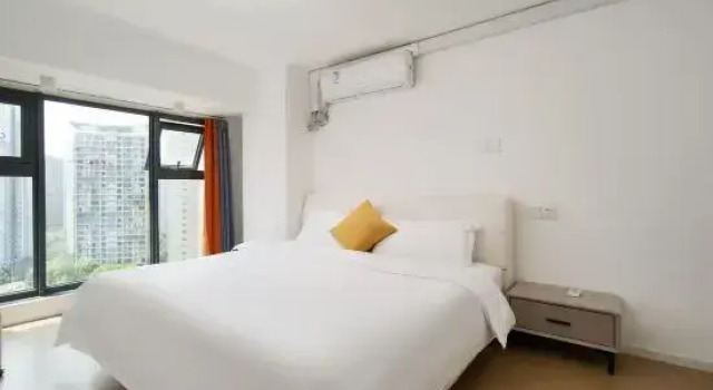 Люкс Deluxe с 3 комнатами Yunshuiju Hotel Apartment (East Railway Station Universal Hui Branch)