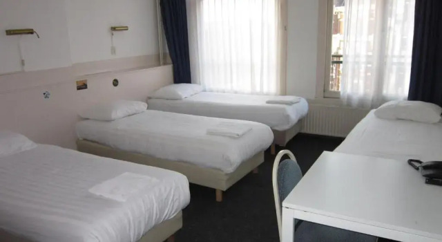 Четырёхместный номер Standard Hotel Titus City Centre