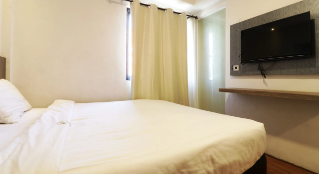 Номер Deluxe Hotel Sanrina Makassar