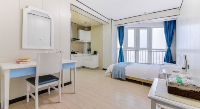 Люкс Premier Xiduoduo Holiday Hotel(喜多多海景假日酒店（南戴河仙螺岛店）)