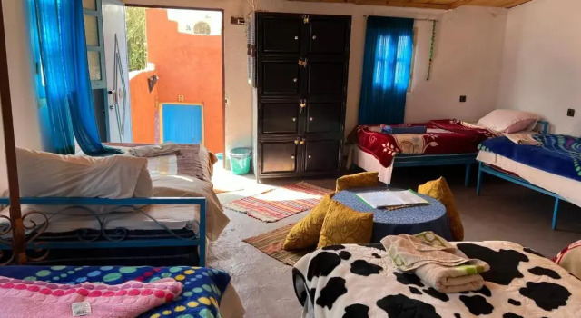Кровать в общем номере Le Retour au calme Maison dhôtes