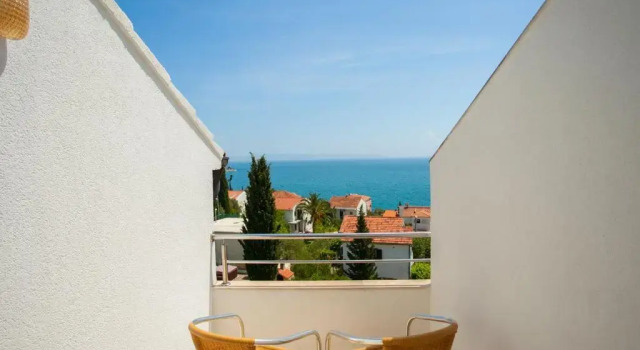Апартаменты с 2 комнатами с балконом и с видом на море Apartments Kairos