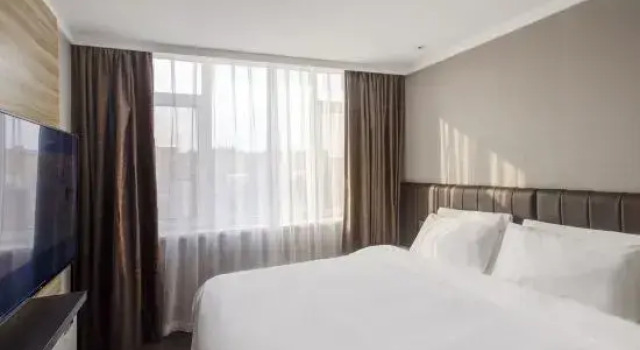 Люкс Business HanTing Hotel (Donggang Huanghai Dashichang)