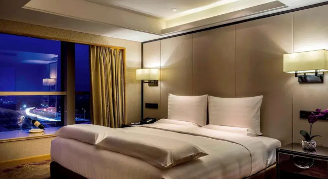 Номер Deluxe Pullman Qingdao Ziyue