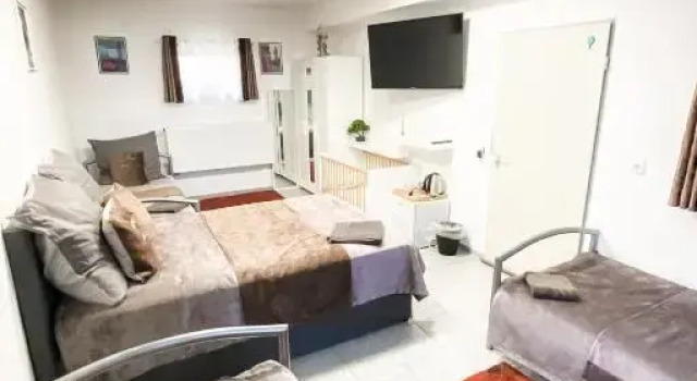 Четырёхместный номер Standard Tau Design Hotel