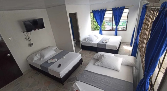 Habitación cuádruple Estándar con balcón y con vista a la ciudad Hotel Santander Express