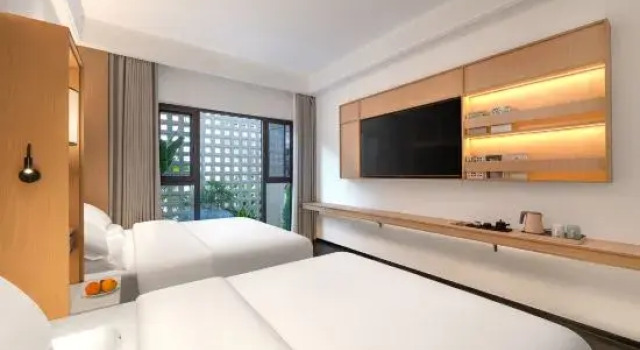 Двухместный семейный люкс Xipan Niaoyu Huaxiang Courtyard (Dehong Mangshi Daizu Guzhen)