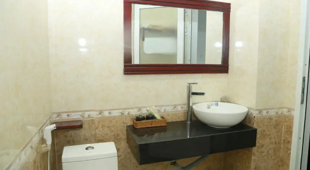 Кровать в общем номере Green Valley Hotel