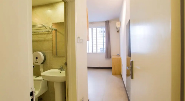 Кровать в общем номере Wada Hostel in Yangshuo