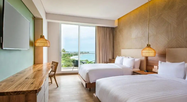 Четырёхместный номер Standard с балконом и с частичным видом на океан Santa Marta Marriott Resort Playa Dormida