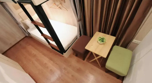 Кровать в общем номере Silom Forest Exclusive Residence