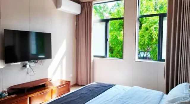 Семейный люкс с 3 комнатами Zhulin Homestay