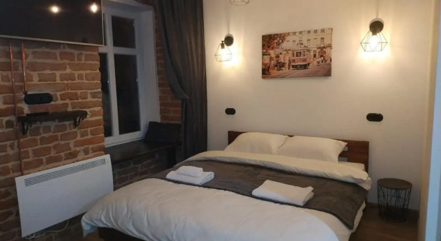 Loft апартаменти з балконом в центрі Львова, Забронировать Апартаменты/квартира Апартаменты Львова, рядом с Первый украинский театр для детей и юношества, Апартаменты/квартира