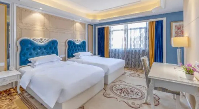 Четырёхместный семейный люкс Taikun International Hotel (Hengdian Film and Television City Dream Valley Branch)