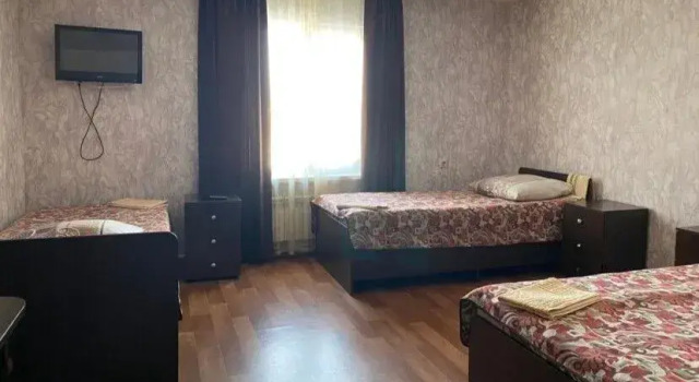 Кровать в общем номере Жемчужина