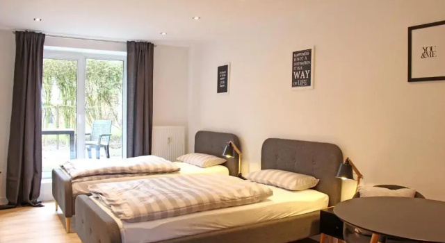 Апартаменты Moderne 1-Zimmer Wohnung mit Terasse, Küche, Bad mit Dusche, TV & WIFI
