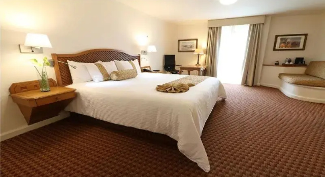 Четырёхместный номер Deluxe Hotel Misión Grand Juriquilla
