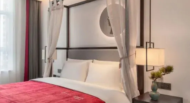 Семейный люкс HAIKO QIANNA HOTEL (Wanlvyuan Friendship Sunshine City Shop)