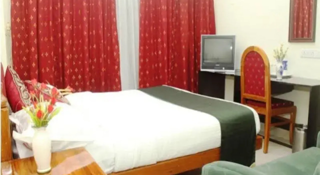 Treebo Teekay International, Rezerwuj Hotel Trivandrum. Nowe Delhi