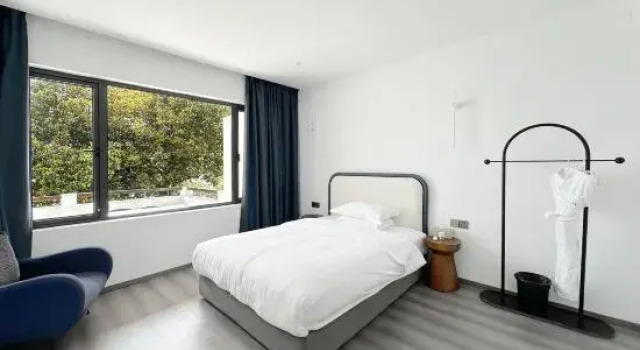 Семейный люкс с видом на море Xiangshuyuan Haishang Muxin Hostel