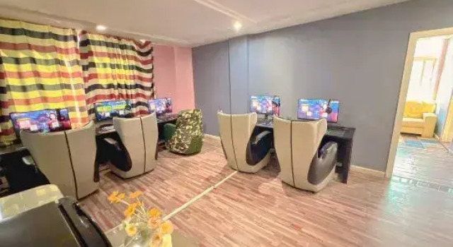 Кровать в общем номере Xinghe Movie and E-sports Homestay (Heyuan Asia's Tallest Fountain)