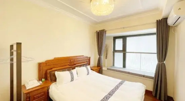 Люкс с 2 комнатами с видом на сад Qidong Haishangju Holiday Apartment (Hengda Venice)