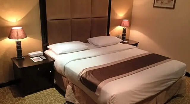 Номер Deluxe London Suites Hotel