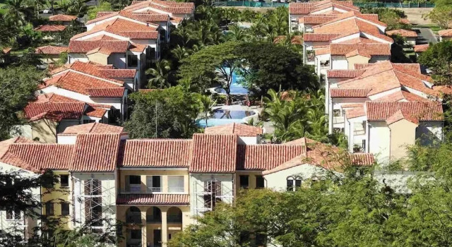 Ground-floor unit in front of lazy river pool at Pacifico in Coco
