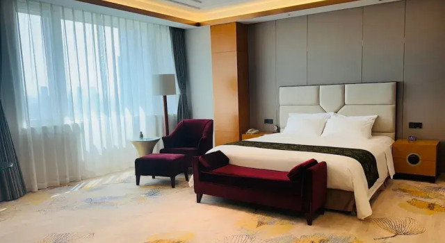 Номер Executive Tianjin Saixiang Hotel